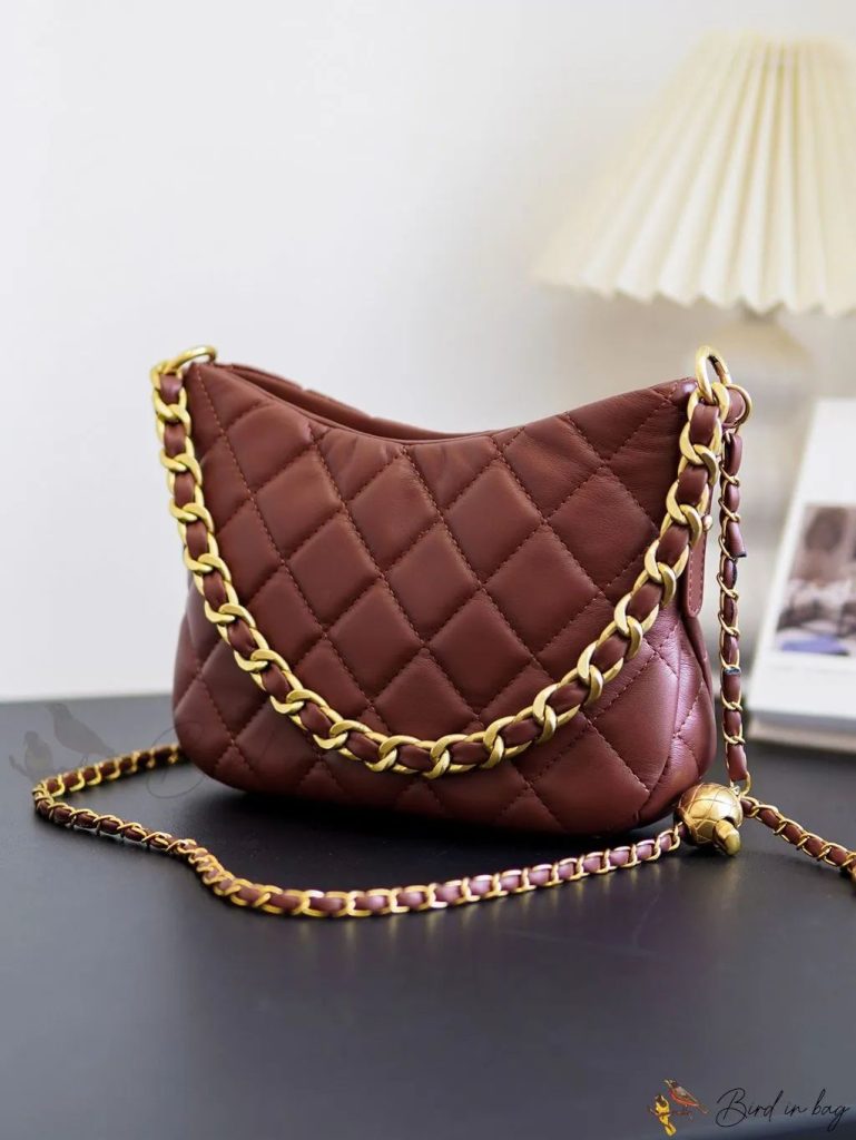 کیف زنانه زرشکی با جزئیات فلزی