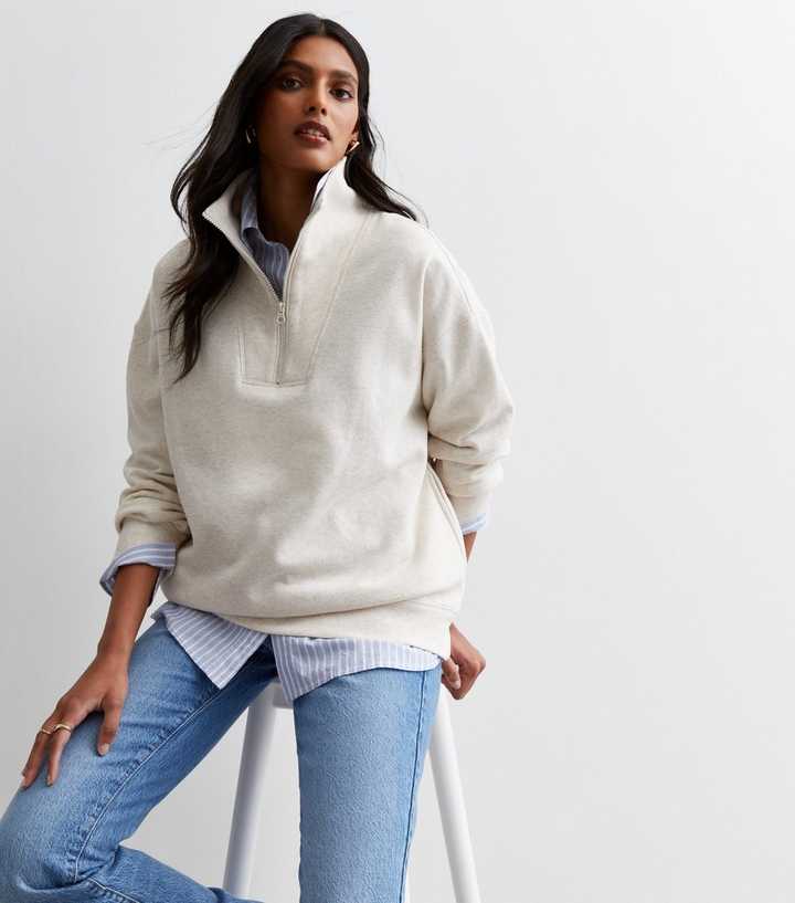 سویشرت زیپ‌دار کرمی زنانه