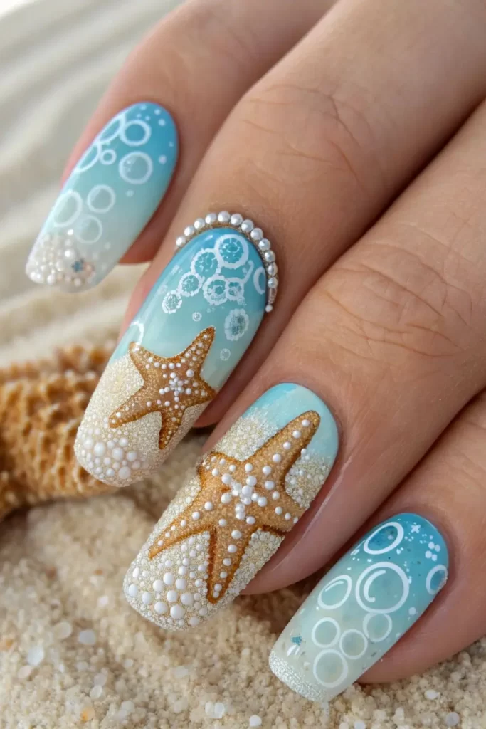 دیزاین ناخن ابی با طرح ستاره دریایی